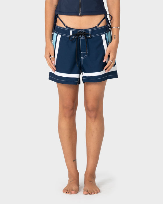 woman-wearing-ruster-buster-boardshorts-in-sea-blue