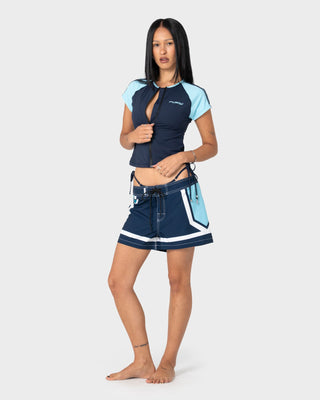 woman-wearing-ruster-buster-boardshorts-in-sea-blue