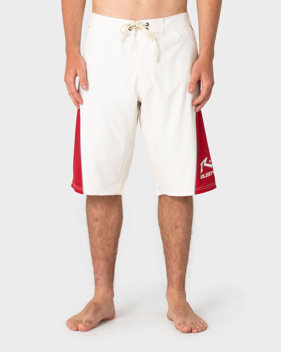 man-wearing-plot-twist-boardshort-in-cream