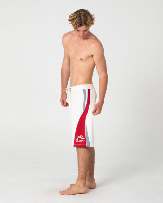 man-wearing-plot-twist-boardshort-in-cream