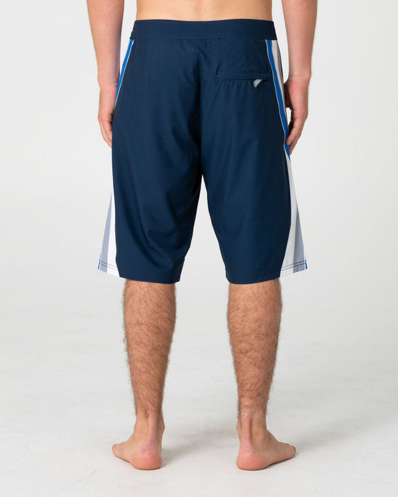 man-wearing-plot-twist-boardshort-in-navy-blue-1