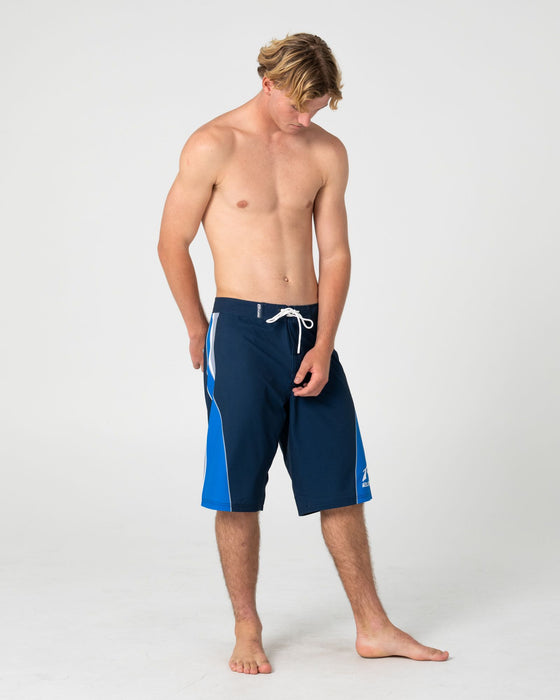 man-wearing-plot-twist-boardshort-in-navy-blue-1