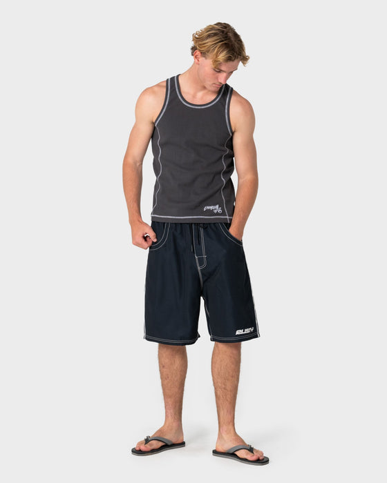 man-wearing-flip-daddy-boardshort-in-black-4