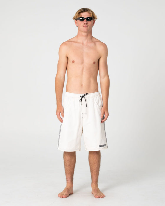 man-wearing-flip-daddy-boardshort-in-cream
