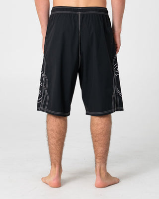 Man wearing Tombstones Hybrid Waist Boardshort in Black
