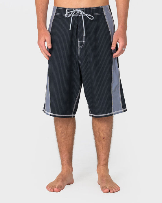 man-wearing-cybernate-fixed-waist-boardshort-in-black-1