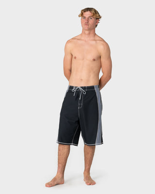 man-wearing-cybernate-fixed-waist-boardshort-in-black-grey