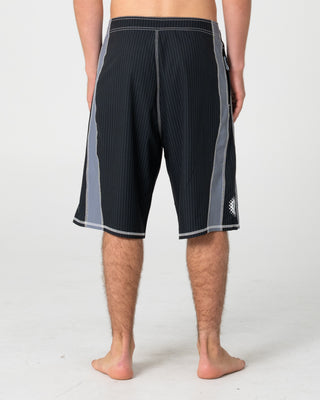 Man wearing Cybernate Fixed Waist Boardshort in Black Grey