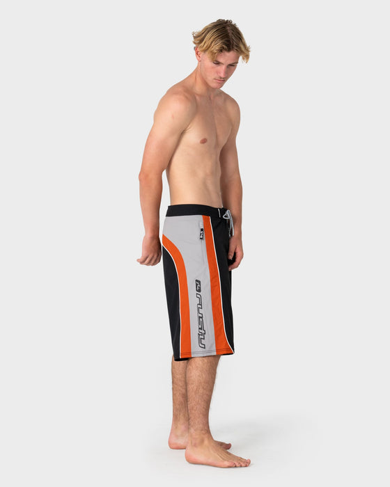 man-wearing-power-wing-fixed-waist-boardshort-in-black