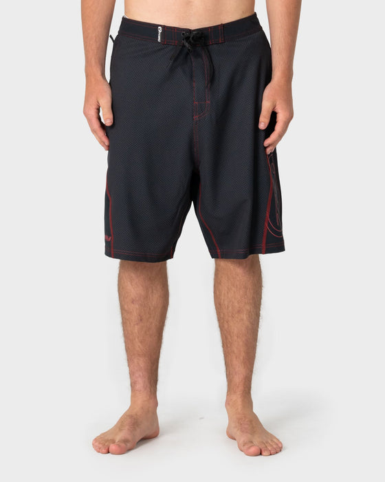 man-wearing-hydro-surge-fixed-waist-boardshort-in-black-1