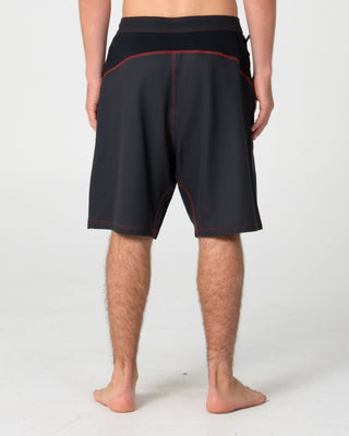 Man wearing Hydro-surge Fixed Waist Boardshort in Black 1