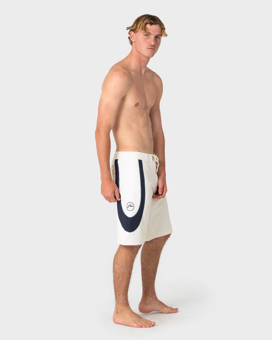 man-wearing-charger-fixed-waist-boardshort-in-cream