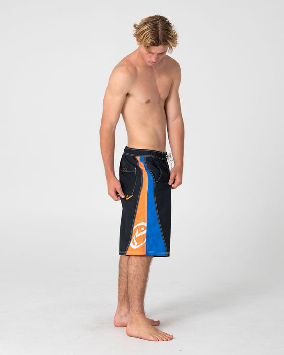 man-wearing-carnage-hybrid-waist-boardshort-in-black