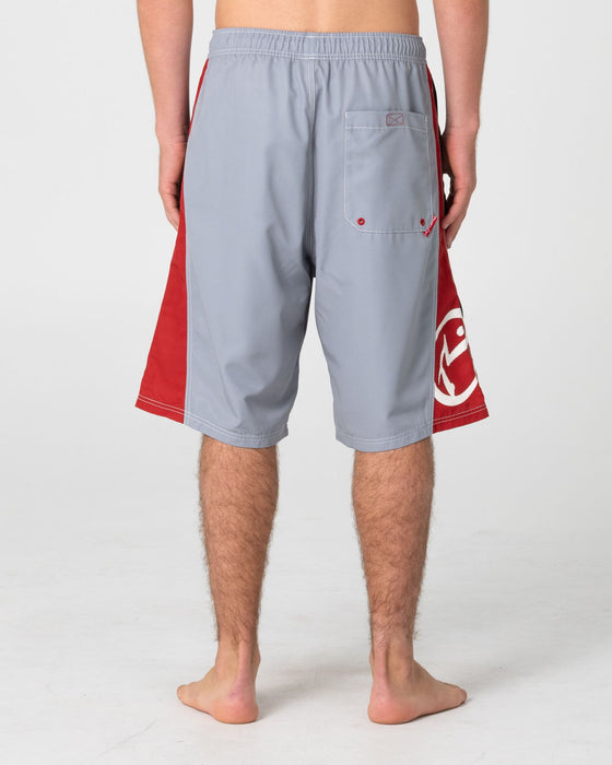 man-wearing-carnage-hybrid-waist-boardshort-in-stone-grey