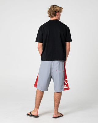 Man wearing Carnage Hybrid Waist Boardshort in Stone Grey