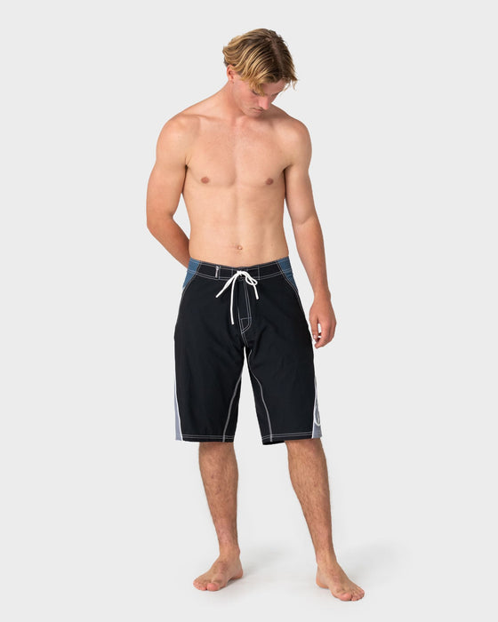 man-wearing-sandglass-fixed-waist-boardshort-in-black