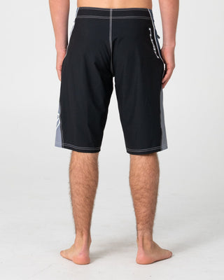 Man wearing Sandglass Fixed Waist Boardshort in Black