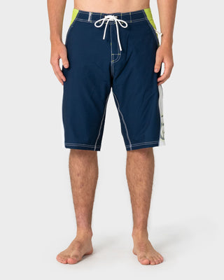 Man wearing Sandglass Fixed Waist Boardshort in Navy Blue 1