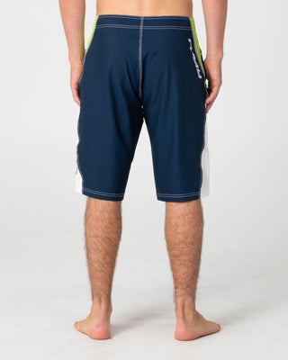 Man wearing Sandglass Fixed Waist Boardshort in Navy Blue 1