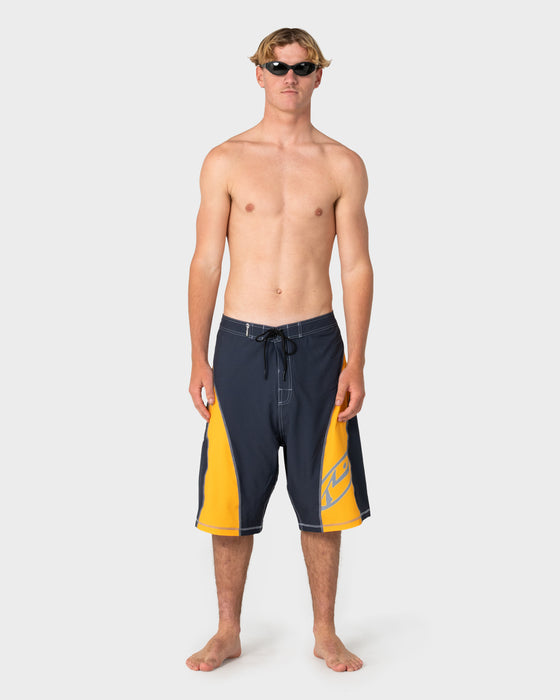 man-wearing-tribalay-fixed-waist-boardshort-in-coal