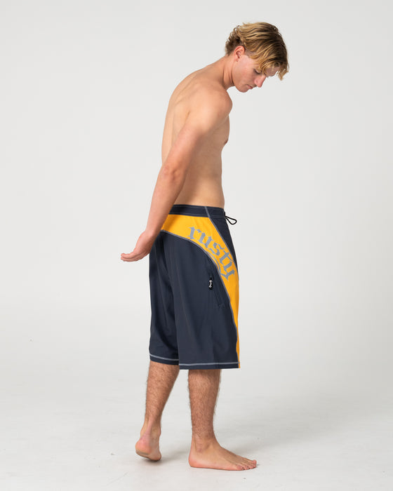 man-wearing-tribalay-fixed-waist-boardshort-in-coal