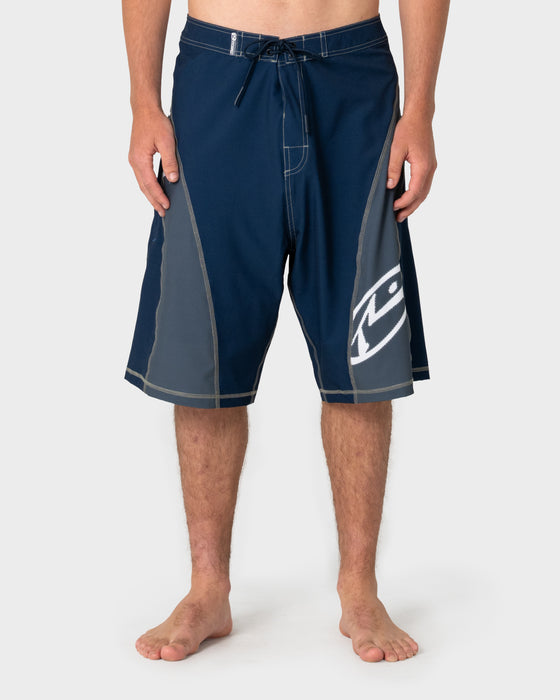man-wearing-tribalay-fixed-waist-boardshort-in-navy-blue