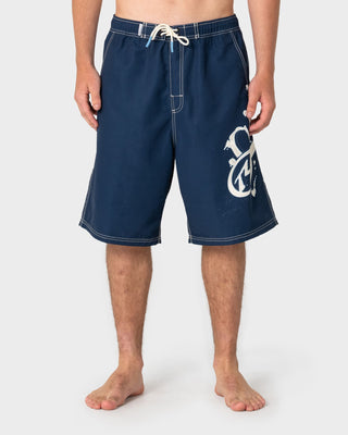 Man wearing Ceathair Hybrid Waist Boardshort in Navy Blue