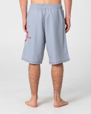 Man wearing Ceathair Hybrid Waist Boardshort in Stone Grey