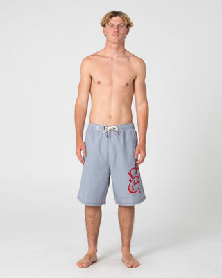 Man wearing Ceathair Hybrid Waist Boardshort in Stone Grey