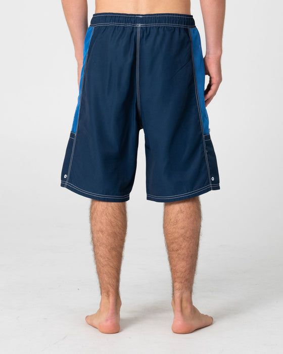 man-wearing-ventilator-hybrid-waist-boardshort-in-navy-blue