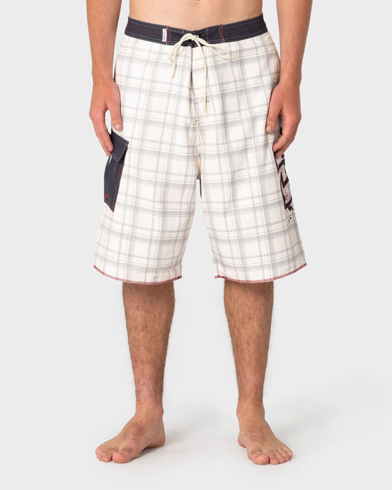 man-wearing-scribbla-fixed-waist-boardshort-in-cream