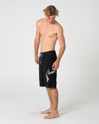 Man wearing Competition Revolution 2.0 Boardshort in Black