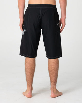 Man wearing Competition Revolution 2.0 Boardshort in Black