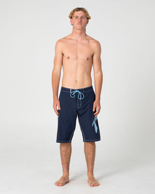 Man wearing Competition Revolution 2.0 Boardshort in Navy Blue