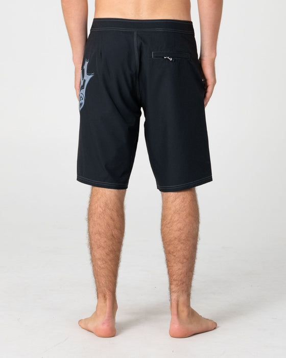 man-wearing-scream-fixed-waist-boardshort-in-black