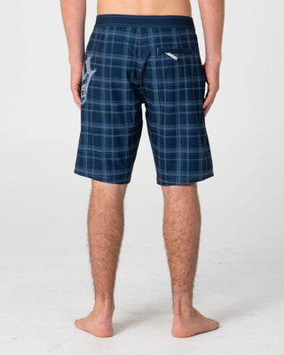 Man wearing Scream Fixed Waist Boardshort in Navy Blue Plaid