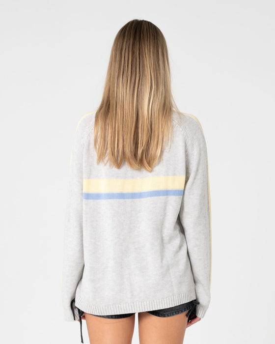 woman-wearing-white-lines-long-sleeve-crew-neck-knit-in-grey-marle-yellow