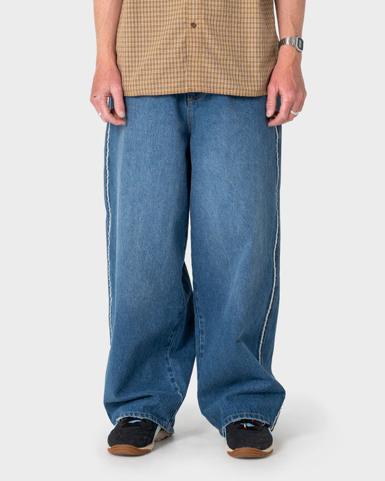 man-wearing-flip-daddy-loaded-jean-in-blasted-middy-blue