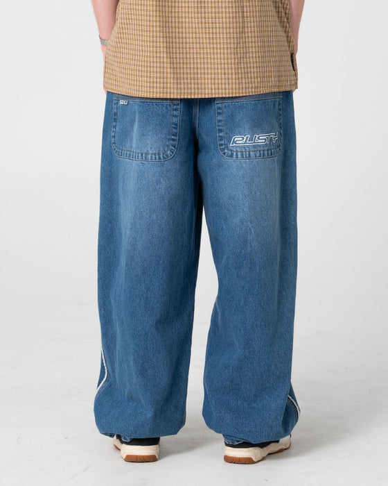 man-wearing-flip-daddy-loaded-jean-in-blasted-middy-blue