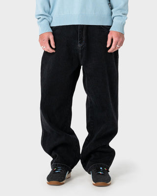 Man wearing Turbo 2.0 Baggy Jean in Black Out / Blue