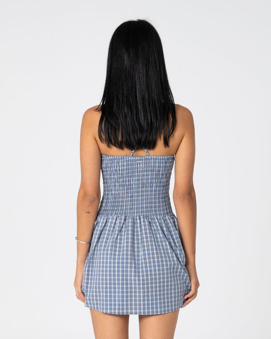 woman-wearing-mimi-smocked-mini-dress-in-blue-check