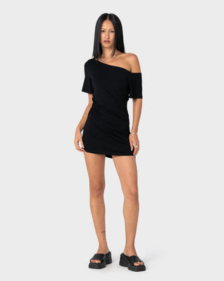 Woman wearing Sally Slouch Off Shoulder Dress in Black