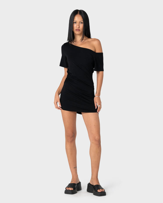 woman-wearing-sally-slouch-off-shoulder-dress-in-black