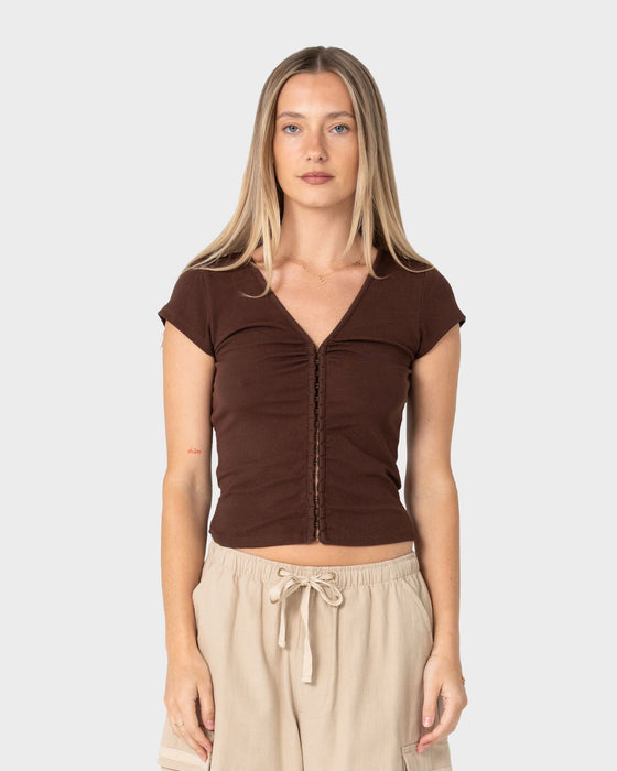 woman-wearing-im-hooked-cap-sleeve-fashion-top-in-java