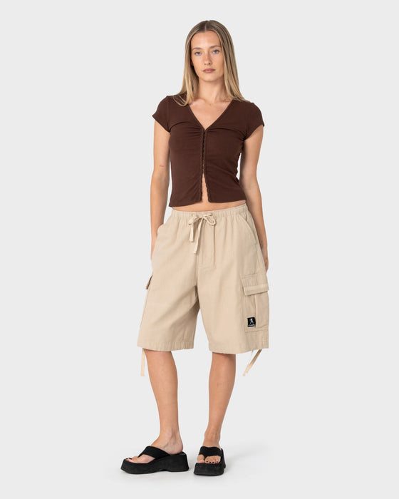 woman-wearing-im-hooked-cap-sleeve-fashion-top-in-java