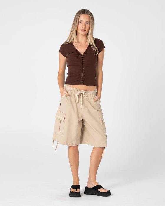 woman-wearing-im-hooked-cap-sleeve-fashion-top-in-java
