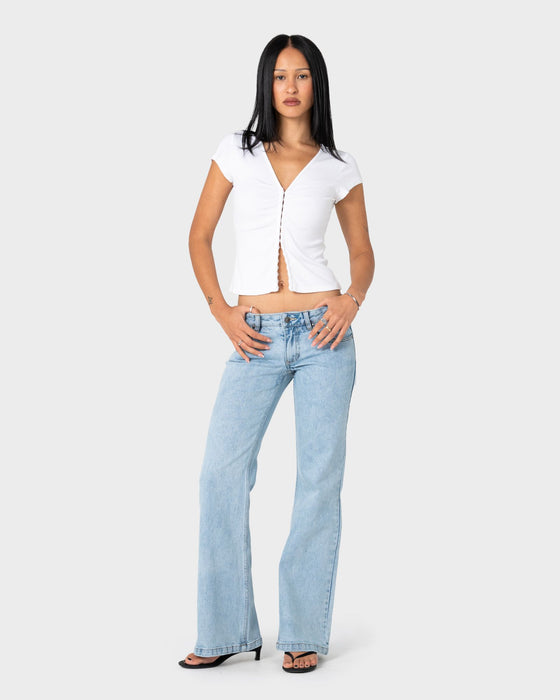 woman-wearing-im-hooked-cap-sleeve-fashion-top-in-white