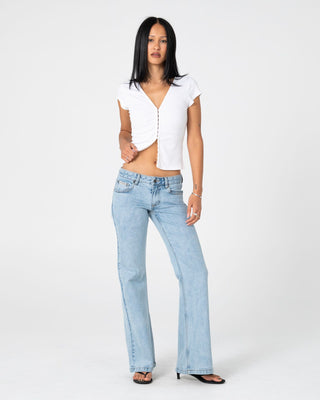 Woman wearing Im Hooked Cap Sleeve Fashion Top in White