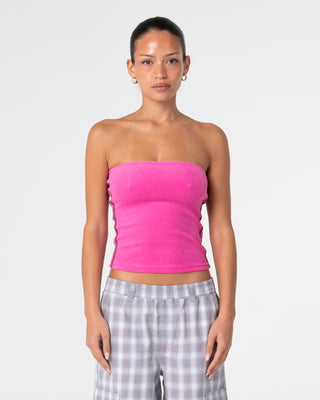 Woman wearing Lamar Towelling Skimmer Tube Top in Fuchsia Pink