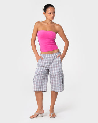 Woman wearing Lamar Towelling Skimmer Tube Top in Fuchsia Pink